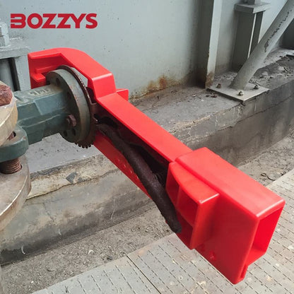 OSHA Compliant LOTO valve lockout, red plastic, installed on industrial valve, by BOZZYS Factory