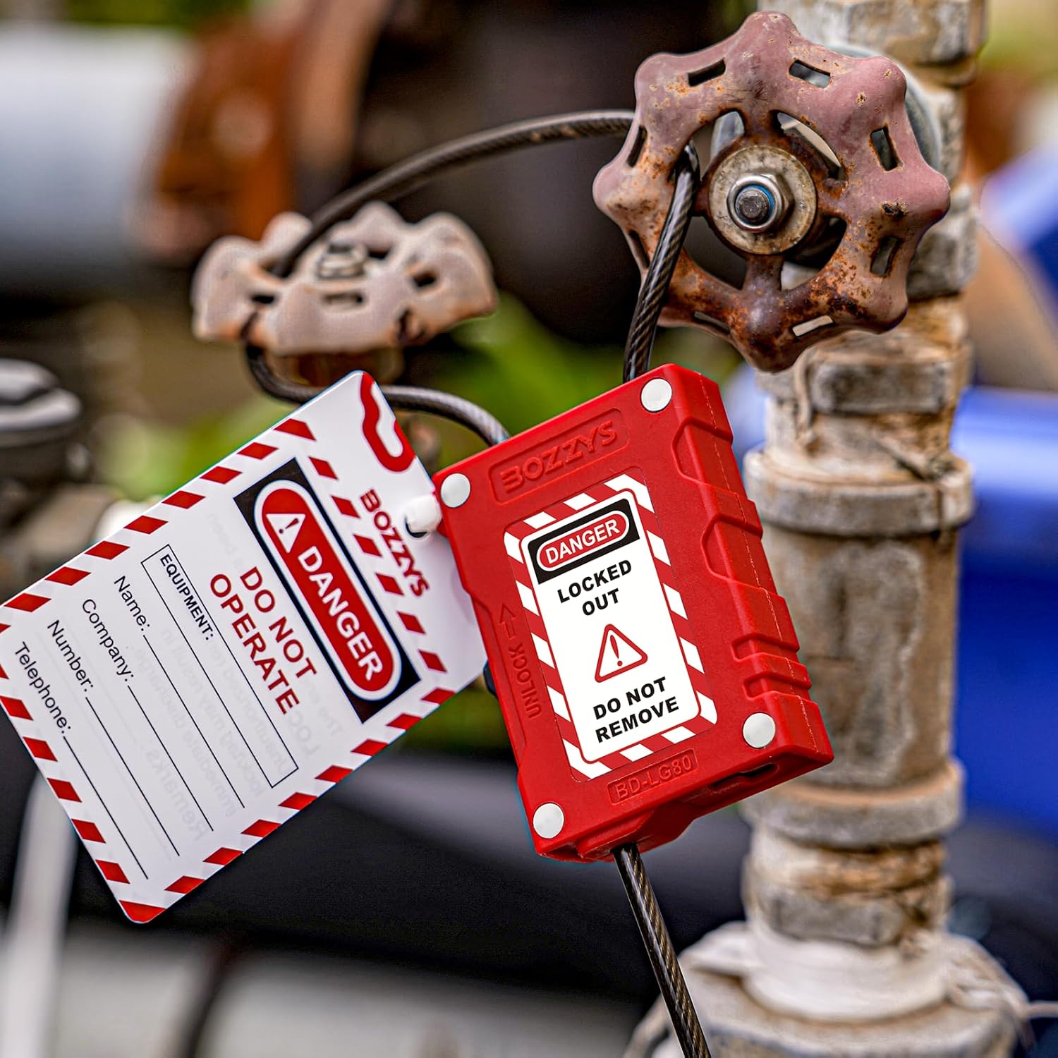 OSHA Compliant LOTO red plastic cable lockout device with tag on valve by BOZZYS Factory