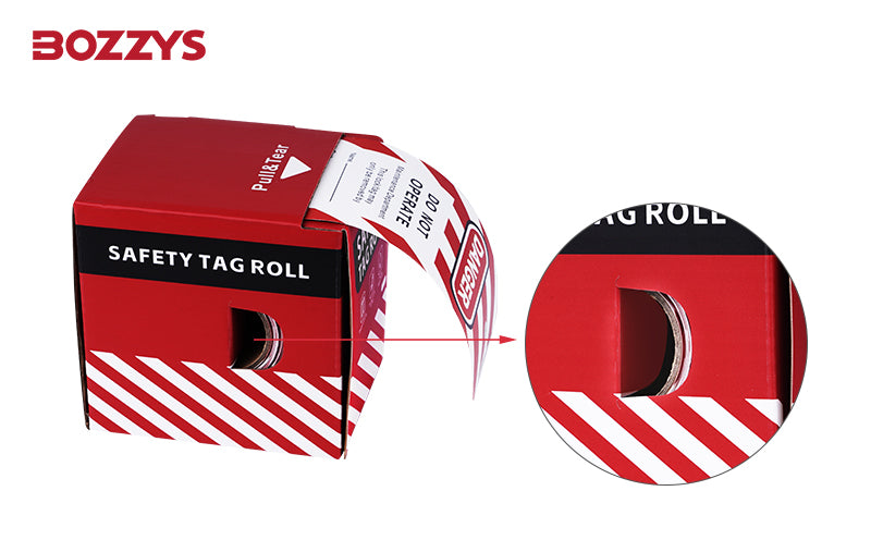 OSHA Compliant LOTO safety tag roll in red cardboard dispenser by BOZZYS Factory