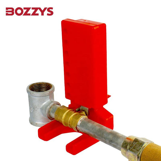 OSHA Compliant red plastic LOTO valve lockout device on metal pipe by BOZZYS Factory