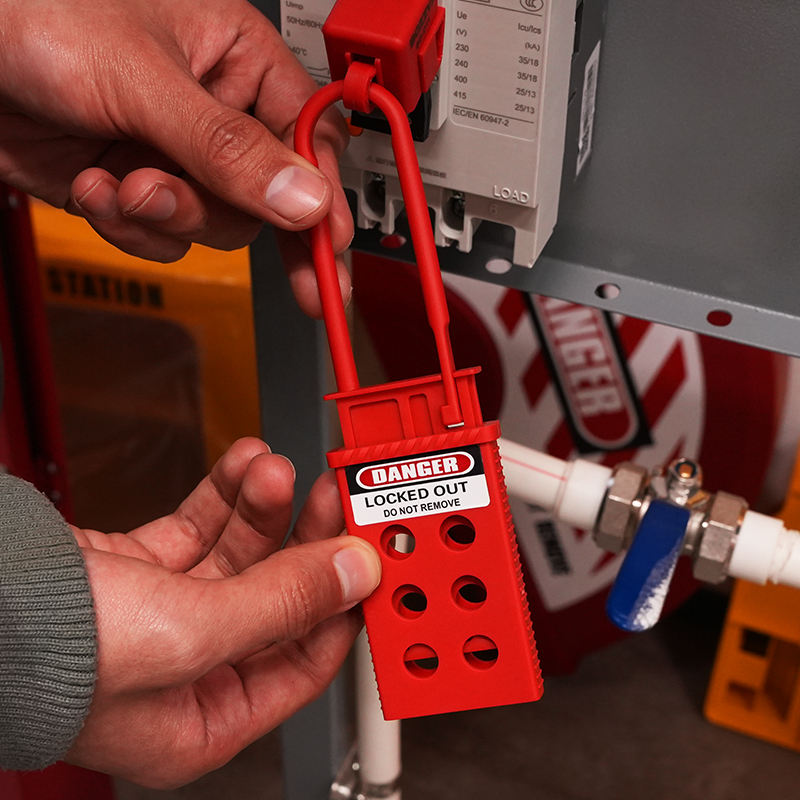 OSHA compliant LOTO safety hasp, red metal, used on electrical panel by BOZZYS Factory